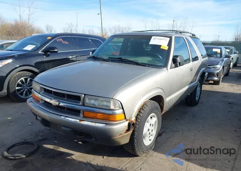 1999 Chevrolet Blazer Ls z USA, uszkodzony, nr VIN 1GNCT18W0XK221929